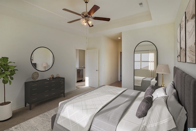 561 Boxwood Bnd, Calera, AL 35040 - bedroom featuring carpet floors, a raised ceiling, ceiling fan, and ornamental molding