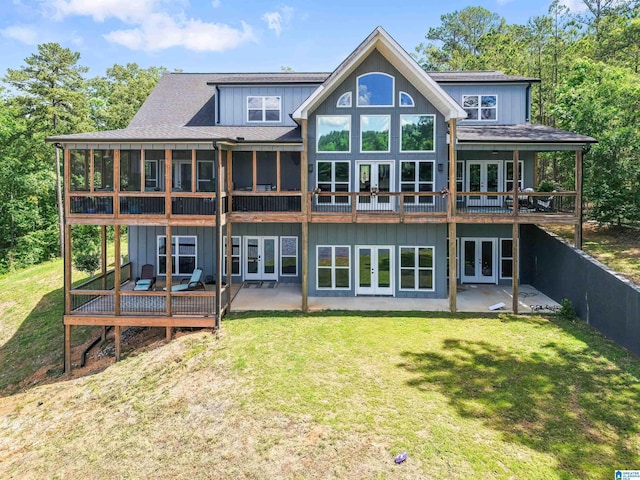 7 Stillwaters Trl, Sylacauga, AL 35151 - back of property with french doors, a yard, and a patio