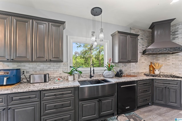 7 Stillwaters Trl, Sylacauga, AL 35151 - kitchen featuring wall chimney exhaust hood, decorative backsplash, stainless steel gas cooktop, and a sink