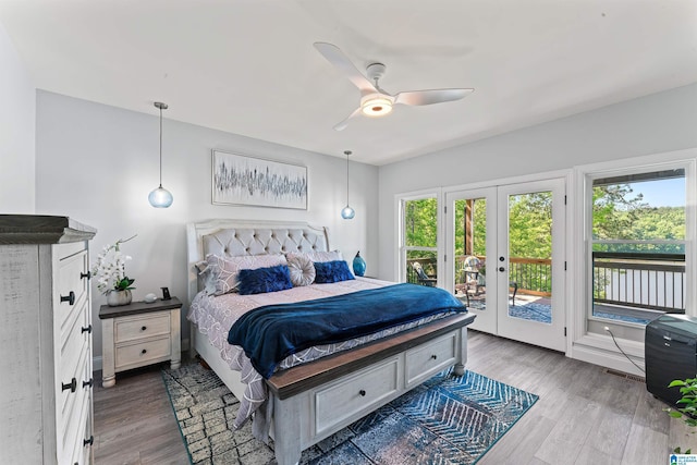 7 Stillwaters Trl, Sylacauga, AL 35151 - bedroom featuring access to outside, french doors, wood finished floors, and ceiling fan