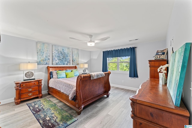 7 Stillwaters Trl, Sylacauga, AL 35151 - bedroom with light wood finished floors, baseboards, and ceiling fan