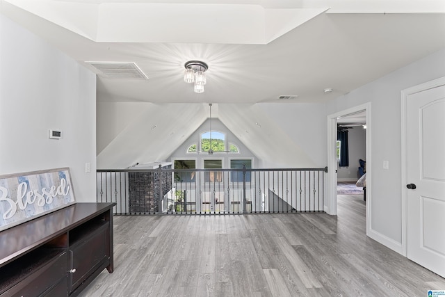 7 Stillwaters Trl, Sylacauga, AL 35151 - bonus room with light wood-style flooring, ceiling fan, lofted ceiling, and baseboards