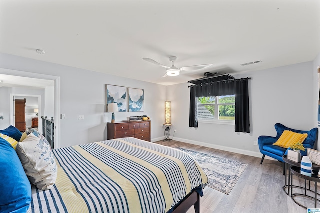 7 Stillwaters Trl, Sylacauga, AL 35151 - bedroom with wood finished floors, baseboards, and ceiling fan