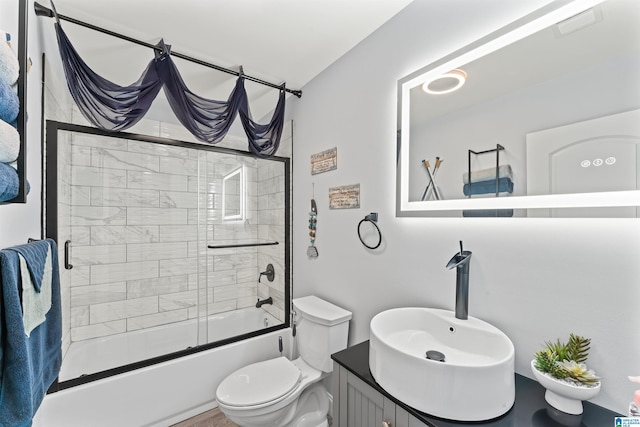 7 Stillwaters Trl, Sylacauga, AL 35151 - bathroom with toilet, shower / bath combination with glass door, and vanity