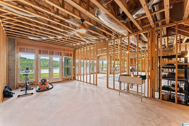 7 Stillwaters Trl, Sylacauga, AL 35151 - miscellaneous room with french doors and concrete floors