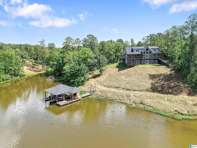 7 Stillwaters Trl, Sylacauga, AL 35151 - dock featuring a water view, a view of trees, and boat lift