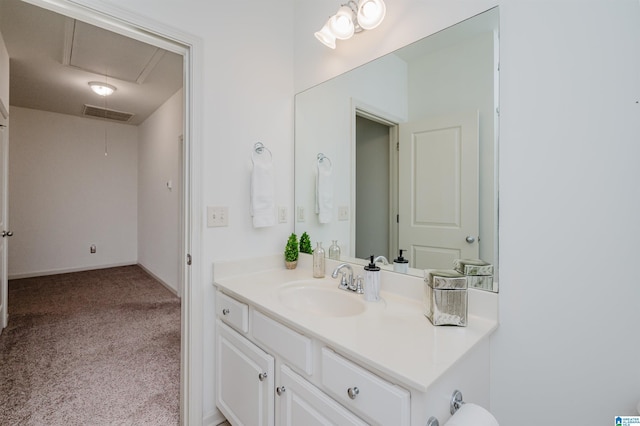 bathroom featuring vanity and baseboards