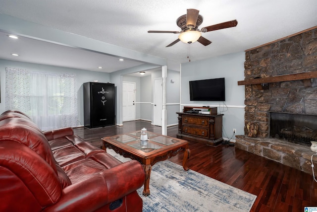 500 2nd Ter, Pleasant Grove, AL 35127 - living area with wood finished floors, ceiling fan, a stone fireplace, and recessed lighting