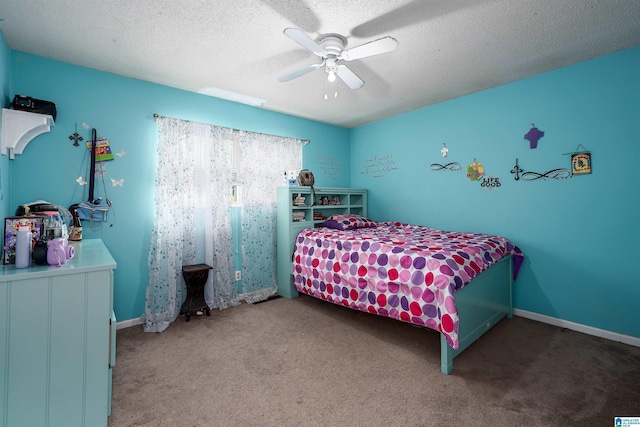 500 2nd Ter, Pleasant Grove, AL 35127 - carpeted bedroom featuring a textured ceiling and ceiling fan
