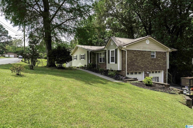 500 2nd Ter, Pleasant Grove, AL 35127 - ranch-style house featuring an attached garage, brick siding, and a front yard