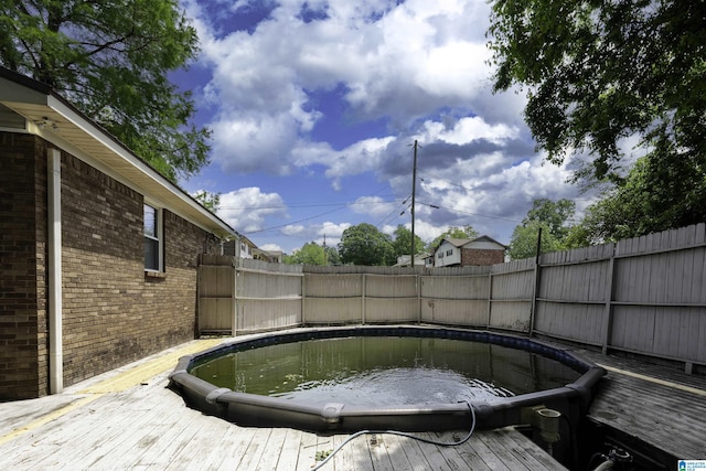500 2nd Ter, Pleasant Grove, AL 35127 - view of swimming pool with a fenced backyard and a wooden deck