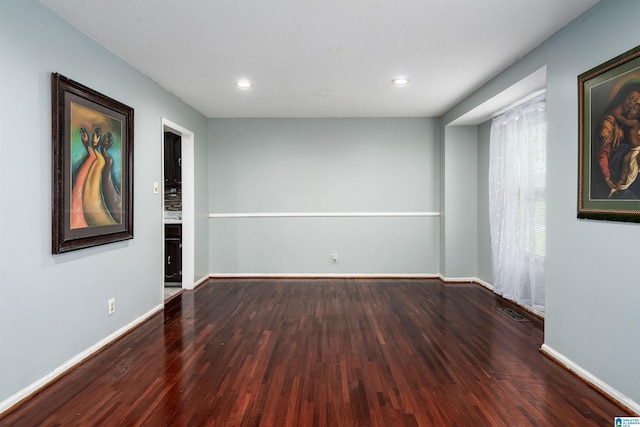 500 2nd Ter, Pleasant Grove, AL 35127 - spare room with wood finished floors, baseboards, and recessed lighting