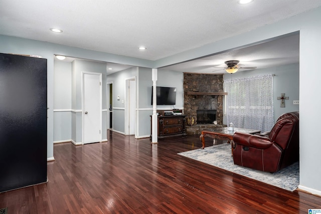 500 2nd Ter, Pleasant Grove, AL 35127 - living area featuring wood finished floors, a ceiling fan, a fireplace, baseboards, and recessed lighting