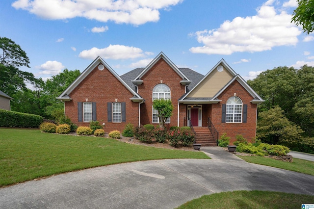 254 Macdonald Lake Rd, Springville, AL 35146 - view of front of home featuring brick siding and a front lawn