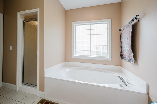 254 Macdonald Lake Rd, Springville, AL 35146 - full bath with a stall shower, a whirlpool tub, and tile patterned flooring