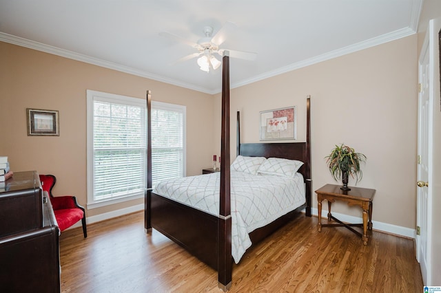 254 Macdonald Lake Rd, Springville, AL 35146 - bedroom with ornamental molding, baseboards, light wood finished floors, and a ceiling fan
