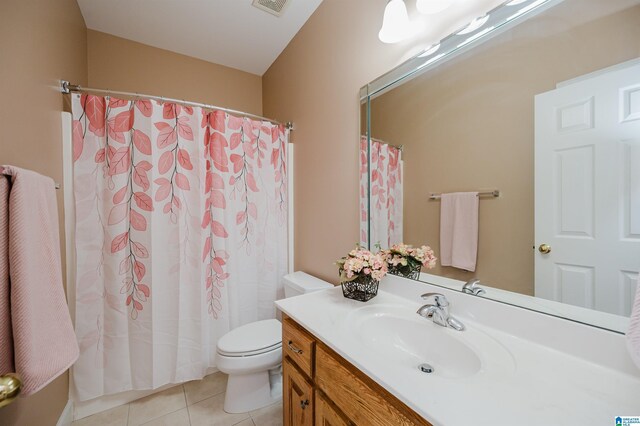 254 Macdonald Lake Rd, Springville, AL 35146 - bathroom featuring tile patterned floors, toilet, and vanity