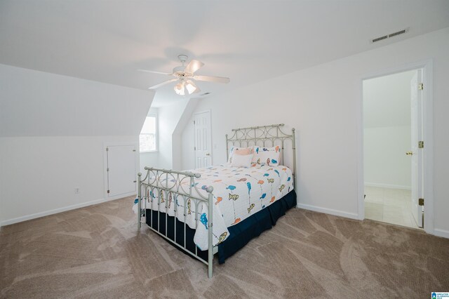 254 Macdonald Lake Rd, Springville, AL 35146 - bedroom featuring carpet floors, vaulted ceiling, baseboards, a ceiling fan, and a closet