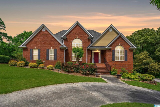 254 Macdonald Lake Rd, Springville, AL 35146 - view of front facade with brick siding and a yard