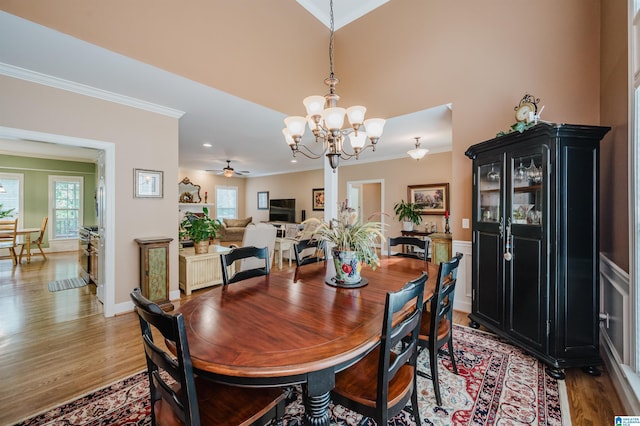 254 Macdonald Lake Rd, Springville, AL 35146 - dining room featuring light wood-style floors, a chandelier, ornamental molding, a ceiling fan, and recessed lighting