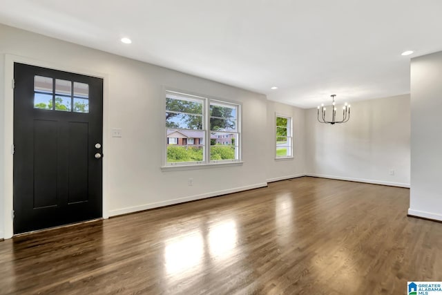 1324 Laurence St, Irondale, AL 35210 - foyer with a chandelier, dark wood-style flooring, baseboards, and recessed lighting