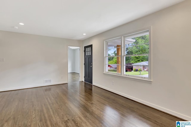 1324 Laurence St, Irondale, AL 35210 - unfurnished room featuring baseboards, wood finished floors, and recessed lighting