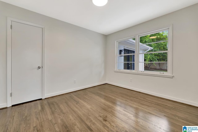 1324 Laurence St, Irondale, AL 35210 - unfurnished room featuring wood finished floors and baseboards