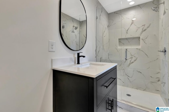 1324 Laurence St, Irondale, AL 35210 - bathroom featuring vanity and a marble finish shower