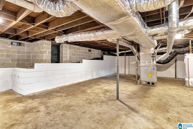 1324 Laurence St, Irondale, AL 35210 - unfinished basement with water heater and heating unit