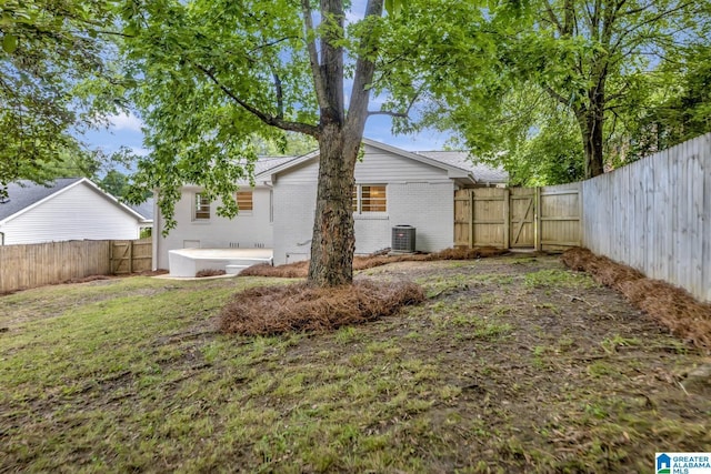 1324 Laurence St, Irondale, AL 35210 - view of yard with a gate, central AC, and a patio area