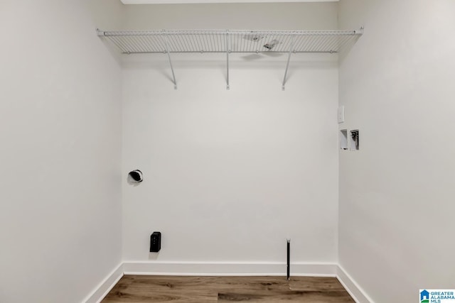 1324 Laurence St, Irondale, AL 35210 - clothes washing area featuring baseboards and wood finished floors