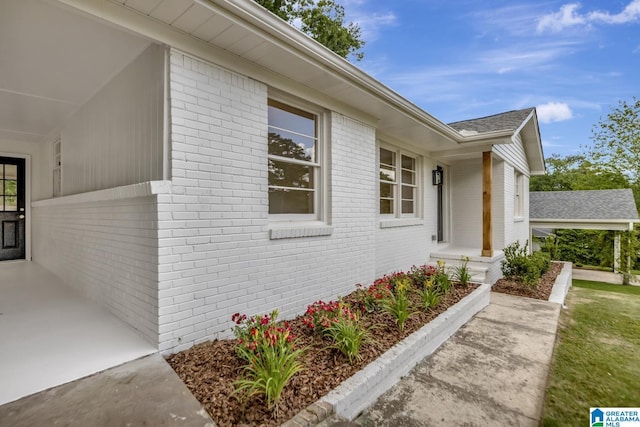 1324 Laurence St, Irondale, AL 35210 - doorway to property with brick siding and a shingled roof