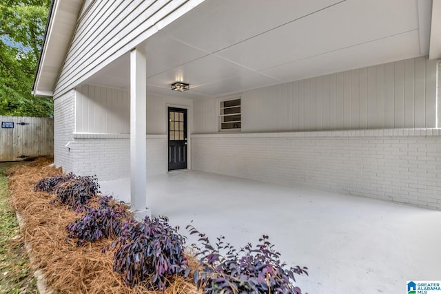1324 Laurence St, Irondale, AL 35210 - view of patio / terrace featuring an attached carport and fence