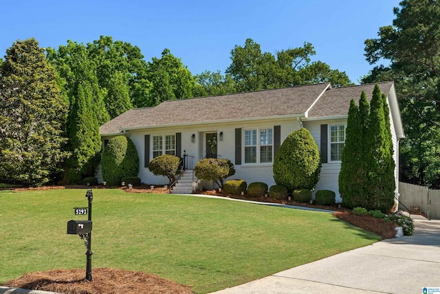 5292 Birdsong Rd, Birmingham, AL 35242 - ranch-style house with a front lawn, brick siding, and a shingled roof