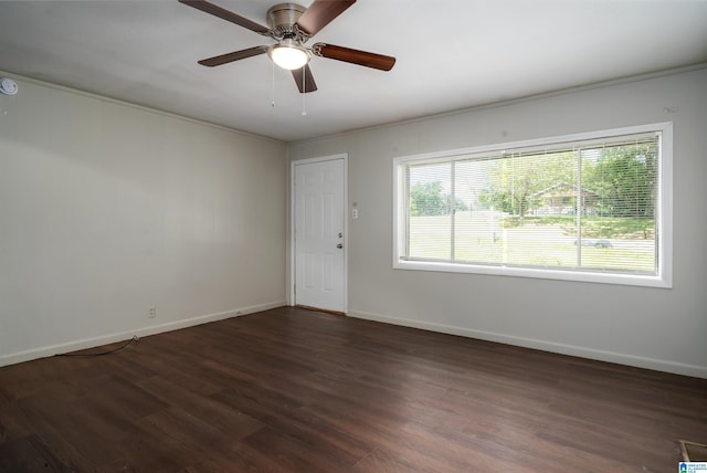 415 Thomas St, Warrior, AL 35180 - spare room with dark wood-style flooring, baseboards, and ceiling fan