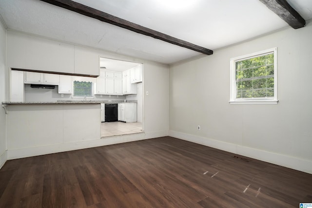 415 Thomas St, Warrior, AL 35180 - unfurnished living room with beamed ceiling, wood finished floors, and baseboards