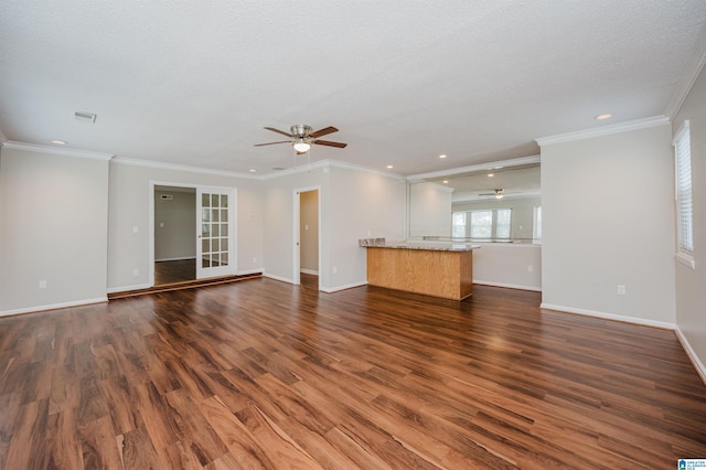 1829 Creely Dr, Birmingham, AL 35235 - unfurnished living room with a ceiling fan, dark wood-style flooring, recessed lighting, baseboards, and ornamental molding