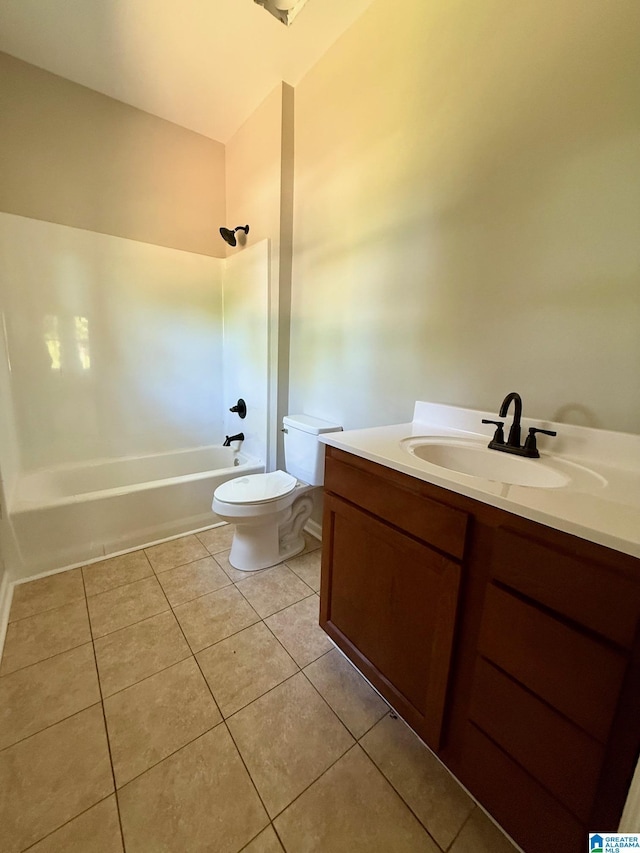 7209 Pamela St, Leeds, AL 35094 - full bathroom with vanity, toilet, tile patterned floors, and washtub / shower combination