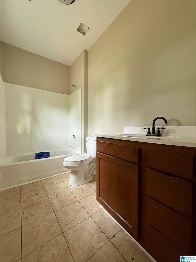 7209 Pamela St, Leeds, AL 35094 - bathroom with vanity, toilet, tile patterned floors,  shower combination, and vaulted ceiling