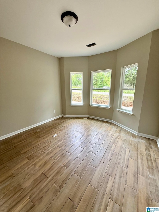 7209 Pamela St, Leeds, AL 35094 - empty room with wood finished floors and baseboards