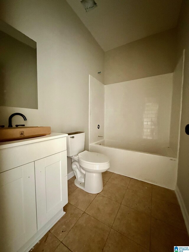 7209 Pamela St, Leeds, AL 35094 - full bath featuring tile patterned floors, toilet, vanity, and shower / tub combination
