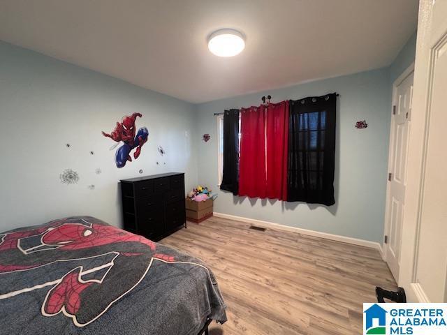 3585 County Road 26, Wadley, AL 36276 - bedroom featuring wood finished floors and baseboards