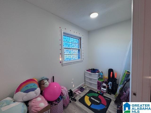3585 County Road 26, Wadley, AL 36276 - game room featuring wood finished floors