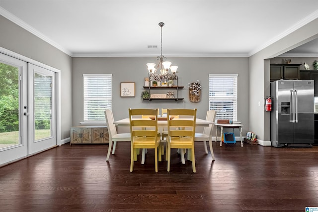300 Braddock Rd W, Springville, AL 35146 - dining room with a chandelier, dark wood finished floors, crown molding, and baseboards