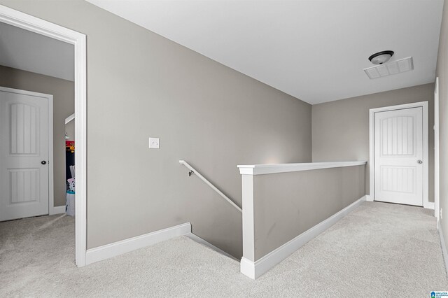 300 Braddock Rd W, Springville, AL 35146 - hallway featuring an upstairs landing, carpet, and baseboards