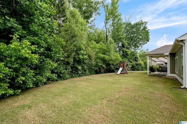 300 Braddock Rd W, Springville, AL 35146 - view of green lawn featuring a playground