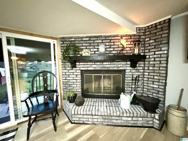 1080 Garmon Rd, Gadsden, AL 35901 - living room featuring wood finished floors, a brick fireplace, and crown molding