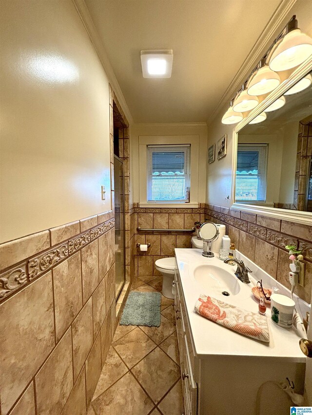 1080 Garmon Rd, Gadsden, AL 35901 - bathroom with tile walls, tile patterned flooring, a wainscoted wall, toilet, and crown molding