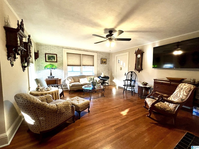 1080 Garmon Rd, Gadsden, AL 35901 - living area featuring a textured ceiling, a ceiling fan, wood finished floors, baseboards, and ornamental molding