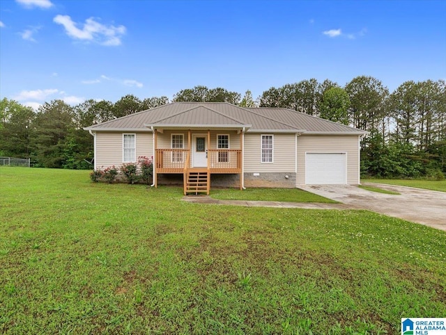 201 Hidden Meadows Dr, Hayden, AL 35079 - ranch-style house with a garage, driveway, covered porch, a front lawn, and metal roof